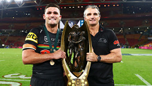 Nathan and Ivan Cleary holding the premiership trophy. (Photo by Chris Hyde/Getty Images)