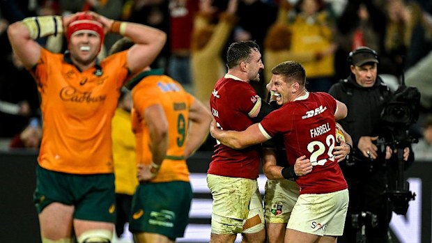 British & Irish Lions players celebrate their side's fifth try.