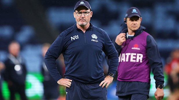 Waratahs coach Dan McKellar watches on.