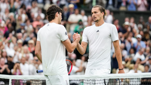 Taylor Fritz (L) with Alexander Zverev. Men's Singles fourth round match during day eight of The Championships Wimbledon 2024.