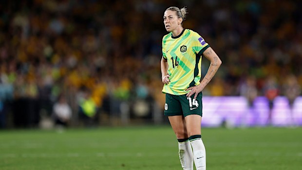 Alanna Kennedy of the Matildas looks on.