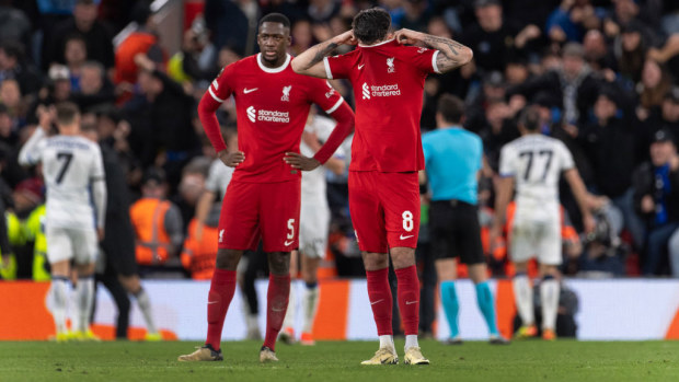 Dominik Szoboszlai and Ibrahima Konate of Liverpool look dejected after Atalanta's third goal.