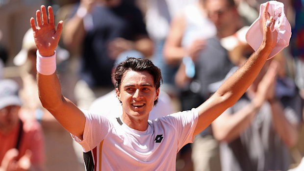 Adam Walton celebrates his win over Medvedev. 
