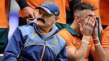 Joe Schmidt wearing a fake moustache in honour of the last international match for Nic White.