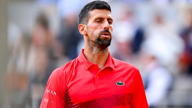 Novak Djokovic of Serbia looks dejected.