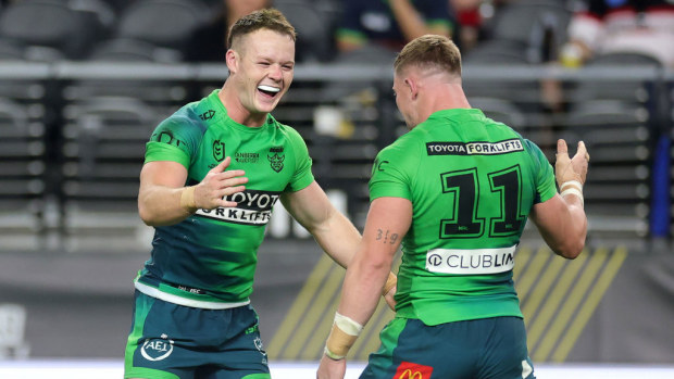 Ethan Strange and Hudson Young of the Raiders celebrate winning the round one NRL match between the Canberra Raiders and the New Zealand Warriors.