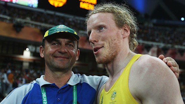  Steve Hooker (R) of Australia celebrates winning gold in the men's pole vault with his coach Alex Parnov at  the Comm Games in 2010