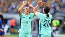 PERTH, AUSTRALIA - OCTOBER 29: Caitlin Foord of the Matildas high fives Sam Kerr of the Matildas after her goal during the AFC Women's Asian Olympic Qualifier match between Philippines and Australia Matildas at Optus Stadium on October 29, 2023 in Perth, Australia. (Photo by James Worsfold/Getty Images)