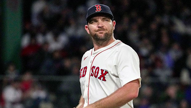 Red Sox relief pitcher Liam Hendriks (31) heads off the field.