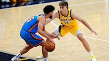 Johnny Furphy of the Indiana Pacers defends Ajay Mitchell of the Oklahoma City Thunder.
