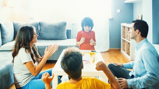 Family playing board games
