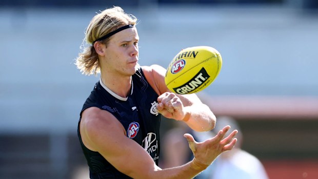 Tom De Koning of the Blues handballs.