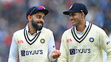 India batsman Virat Kohli shares a joke with Shubman Gill.