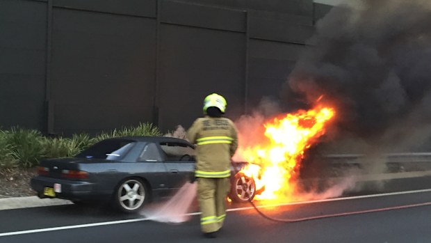 One westbound lane of the M5 is closed at Riverwood due to a car fire. (Supplied, Brad Smith)