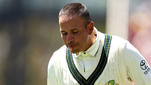 ADELAIDE, AUSTRALIA - JANUARY 19: Usman Khawaja of Australia leaves the field retiring hurt after he was struck while batting during day three of the Mens Test match series between Australia and West Indies at Adelaide Oval on January 19, 2024 in Adelaide, Australia. (Photo by Paul Kane/Getty Images)