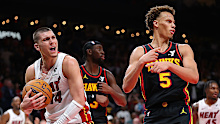 Tyler Herro #14 of the Miami Heat reacts after drawing a foul from Dyson Daniels #5.