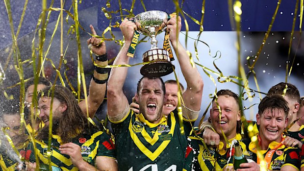 Australia lift the trophy following victory in the Rugby League Ashes match.