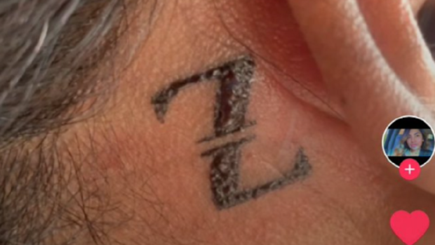 The tattoo's real meaning has since been revealed.