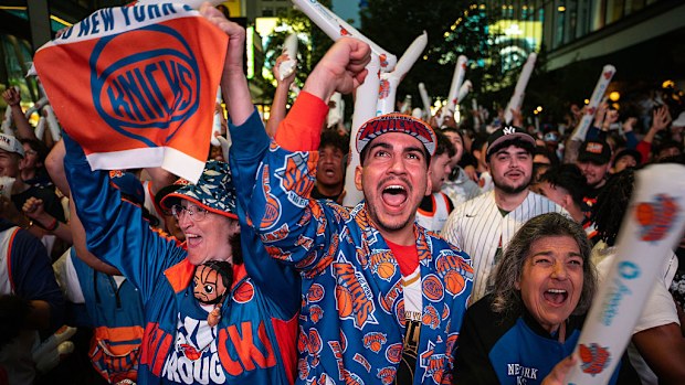 New York Knicks fans cheer during the first quarter.
