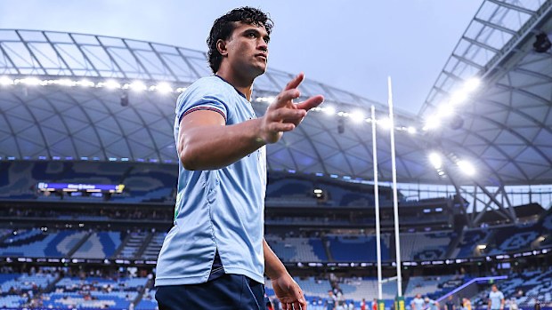 Joseph-Aukuso Suaalii of the Waratahs gestures to the fans.