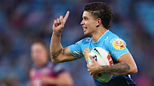 Jayden Campbell celebrates a try for the Gold Coast Titans.