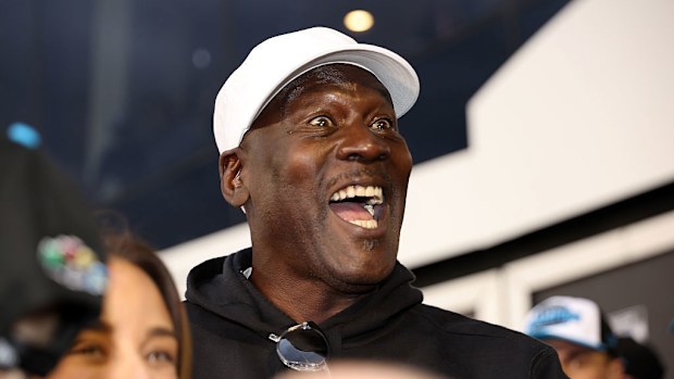 Michael Jordan, NBA Hall of Famer and co-owner of 23XI Racing reacts in victory lane.