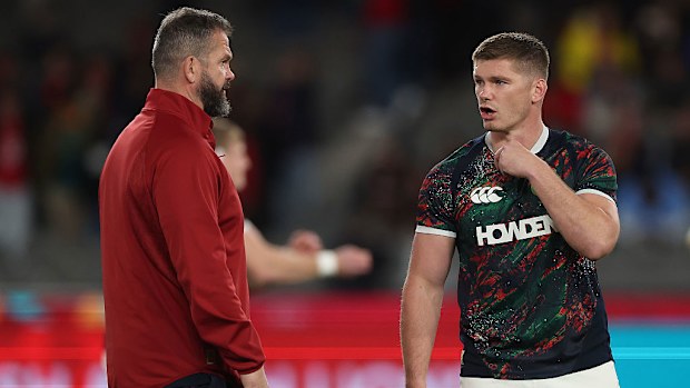 Andy Farrell talks to his son and Lions centre Owen Farrell.