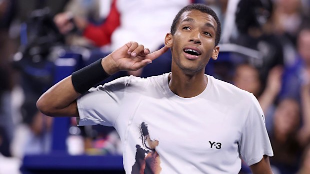 Felix Auger-Aliassime of Canada celebrates after defeating Alexander Zverev of Germany.
