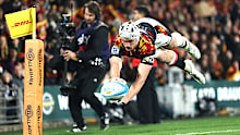 Daniel Sinkinson of the Chiefs scores a try.