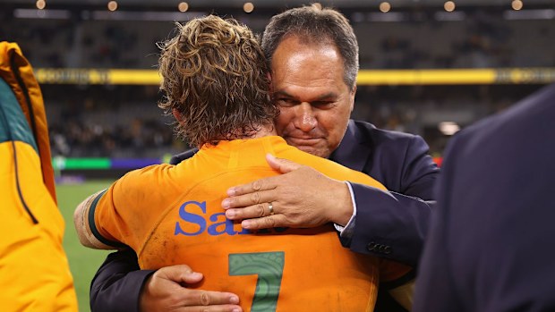 Michael Hooper of the Wallabies and coach Dave Rennie celebrate.