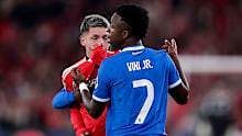 Vinicius Junior of Real Madrid in a clash with Gianluca Prestianni of Benfica.