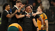Quinn Tupaea of the All Blacks celebrates a try.