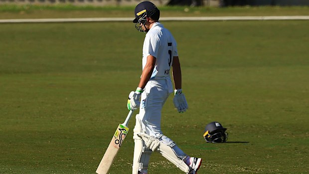 Sam Konstas of New South Wales walks from the field after being dismissed during day one of the Sheffield Shield.