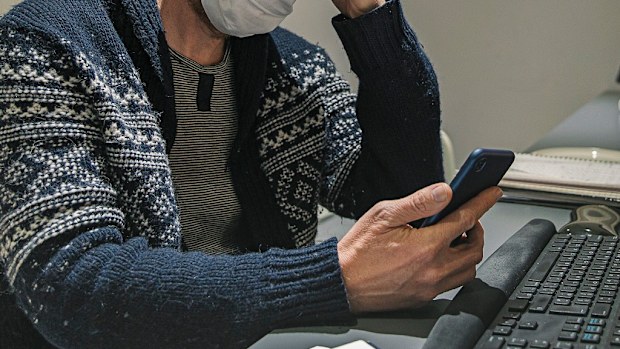 Man working from home on the phone