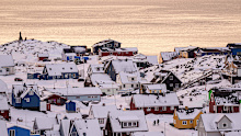 People walk on a street in Nuuk, Greenland, Wednesday, Jan. 14, 2026 
