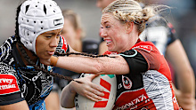 Maddie Studdon of the Dragons is tackled by Chantay Kiria-Ratu of the Sharks.