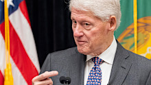 Former US President Bill Clinton speaks in the Cash Room of the Treasury Department during an event for the anniversary of the Community Development Financial Institutions Fund, Nov. 21, 2024, in Washington. 