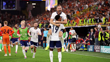 Ollie Watkins of England celebrates victory with Harry Kane after the UEFA EURO 2024 semi-final match between Netherlands and England at Football Stadium Dortmund on July 10, 2024 in Dortmund, Germany. (Photo by Alex Livesey/Getty Images)