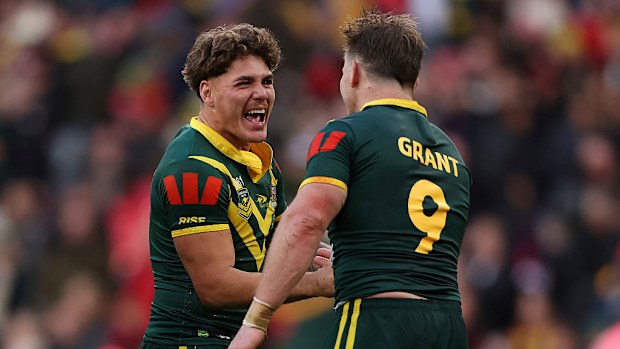 Reece Walsh and Harry Grant of Australia celebrate after winning game one.