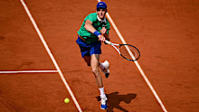 Jannik Sinner of Italy in action against Carlos Alcaraz of Spain.