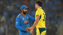 AHMEDABAD, INDIA - NOVEMBER 19: India captain Rohit Sharma shakes hands with Australia captain Pat Cummins after the ICC Men's Cricket World Cup India 2023 Final between India and Australia at Narendra Modi Stadium on November 19, 2023 in Ahmedabad, India. (Photo by Gareth Copley/Getty Images)