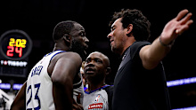 Draymond Green gets into a verbal altercation with a fan.