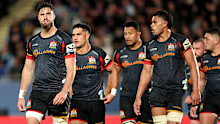 The Chiefs look dejected after losing the 2024 Super Rugby Pacific grand final.