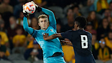 MELBOURNE, AUSTRALIA - MARCH 28: Socceroos goalkeeper Joe Gauci looks to pass the ball under pressure from Kevin Rodriguez of Ecuador during the International Friendly match between the Australia Socceroos and Ecuador at AAMI Park on March 28, 2023 in Melbourne, Australia. (Photo by Daniel Pockett/Getty Images)