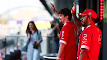 Charles Leclerc of Monaco and Lewis Hamilton of Great Britain and Scuderia Ferrari on the drivers parade.