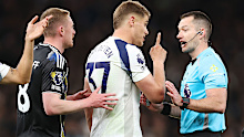 Micky van de Ven of Tottenham Hotspur wags his finger at referee Jarred Gillett.