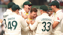 DELHI, INDIA - FEBRUARY 18: Matthew Kuhnemann of Australia celebrates taking the wicket of Virat Kohli of India during day two of the Second Test match in the series between India and Australia at Arun Jaitley Stadium on February 18, 2023 in Delhi, India. (Photo by Robert Cianflone/Getty Images)