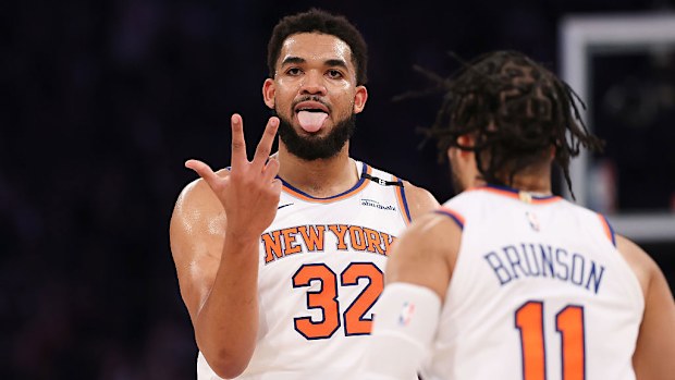 Karl-Anthony Towns of the New York Knicks celebrates a three-point basket.