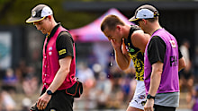 PERTH, AUSTRALIA - FEBRUARY 17: Sam Lalor of the Tigers is escorted off the ground with an injury during the 2025 AFL Match Simulation between the West Coast Eagles and the Richmond Tigers at Mineral Resources Park on February 17, 2025 in Perth, Australia. (Photo by Daniel Carson/AFL Photos via Getty Images)