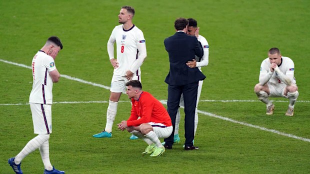 England manager Gareth Southgate consoles Jadon Sancho after his penalty miss following the UEFA Euro 2020 Final at Wembley Stadium, London. Picture date: Sunday July 11, 2021. (Photo by Mike Egerton/PA Images via Getty Images)